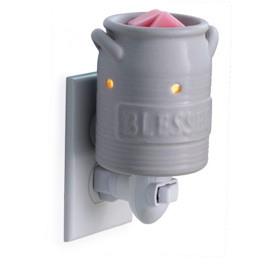 Gray wall-mounted wax warmer with 'Bless' branding on a white background
